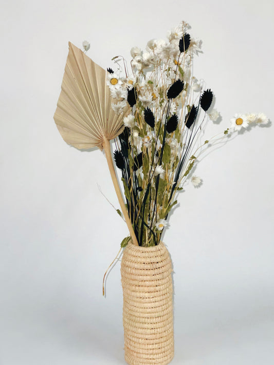 Bouquet of black and white dried flowers